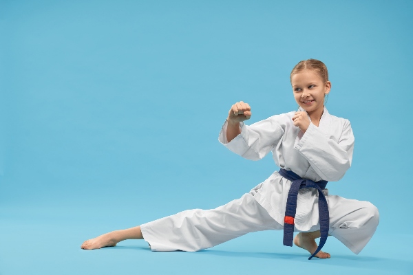 A child practicing martial arts will experience many physical and mental health benefits.